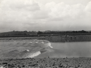 The river Nith's tidal bore seen at Glencaple. Image available in the Dumfries Museum collection